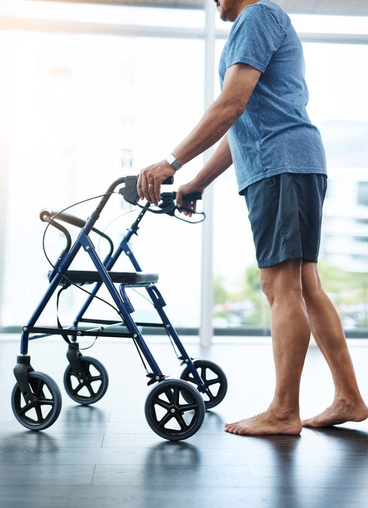 Man walking with a rollator